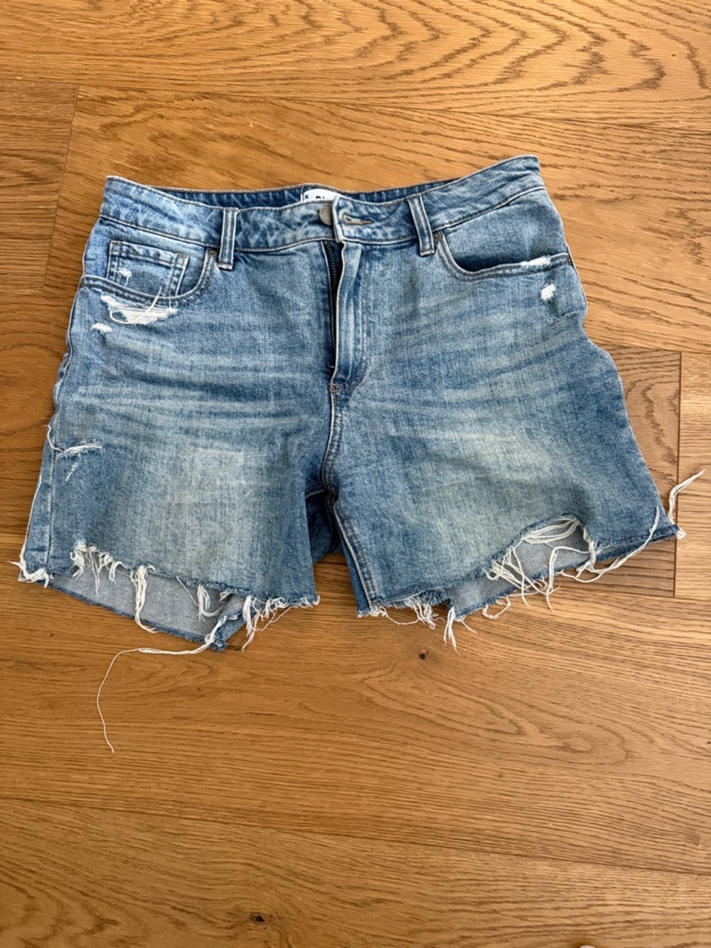 PAIGE Light Blue Distressed Denim Cutoff Shorts